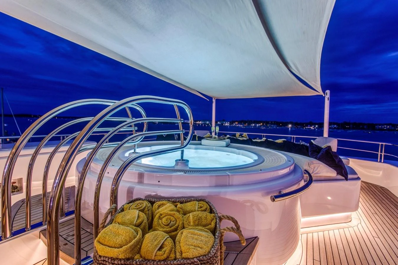 a pool with a basket and a basket on a deck aboard AMICA MEA Yacht for Sale
