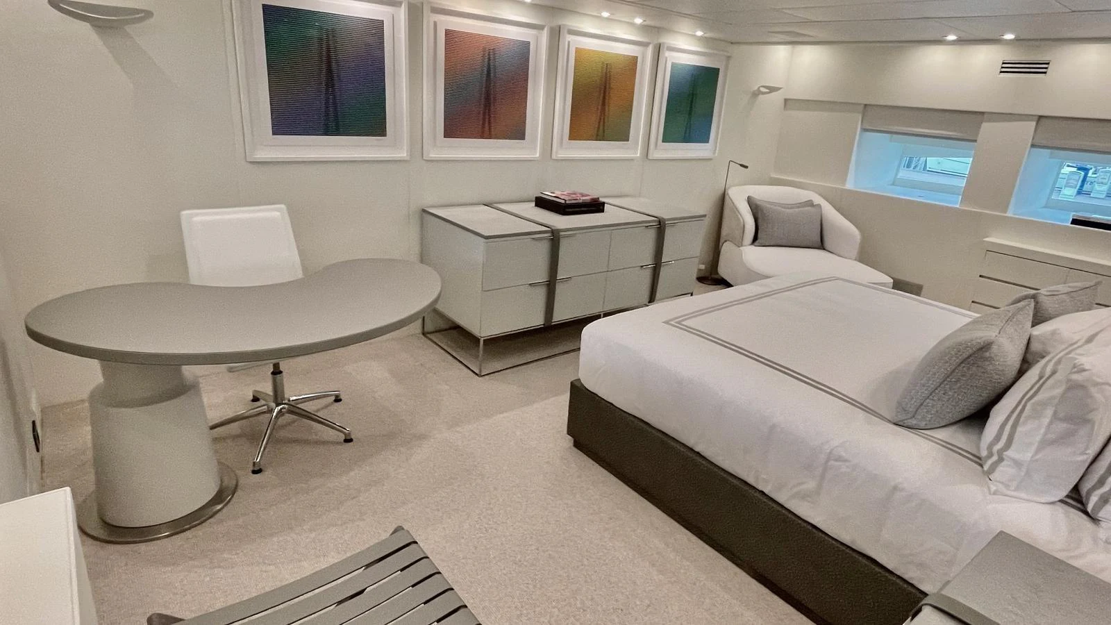 A luxurious stateroom featuring modern furnishings and elegant decor. aboard D'ONE D Yacht for Sale