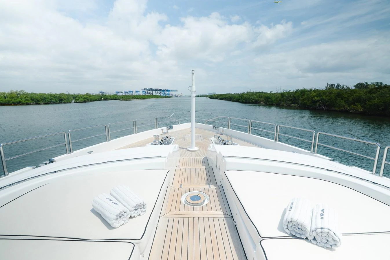 The foredeck offers a spacious and serene area for relaxation with a beautiful view of the waterway. aboard BET ON IT Yacht for Sale