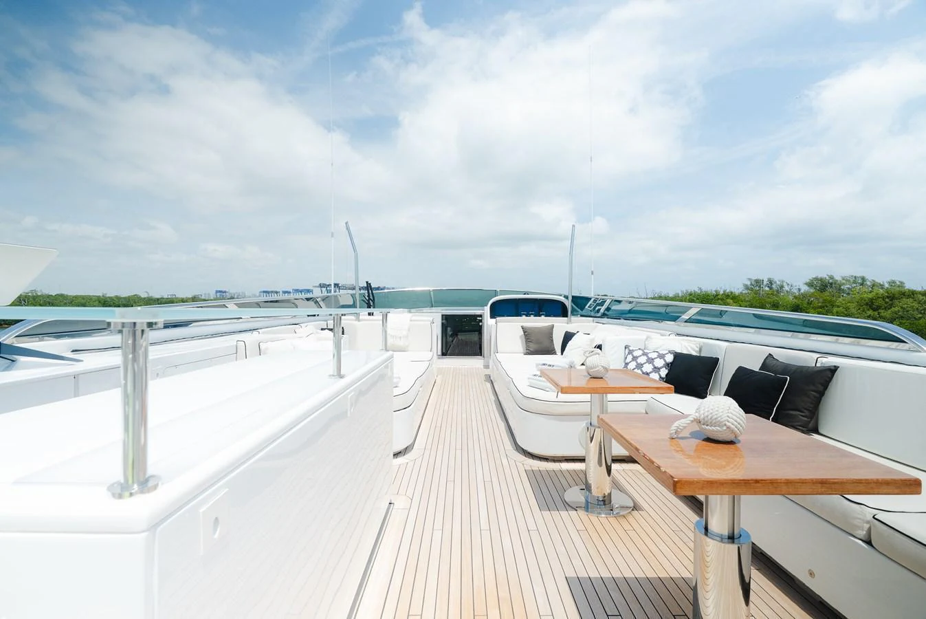 The sundeck offers a spacious and inviting area for relaxation and socializing under the open sky. aboard BET ON IT Yacht for Sale