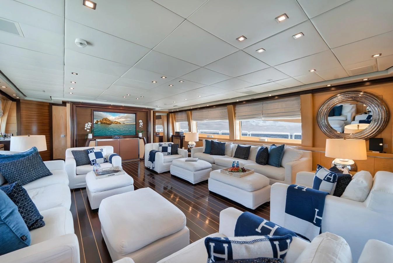 The spacious salon features plush seating and elegant decor, perfect for relaxation and socializing. aboard BET ON IT Yacht for Sale