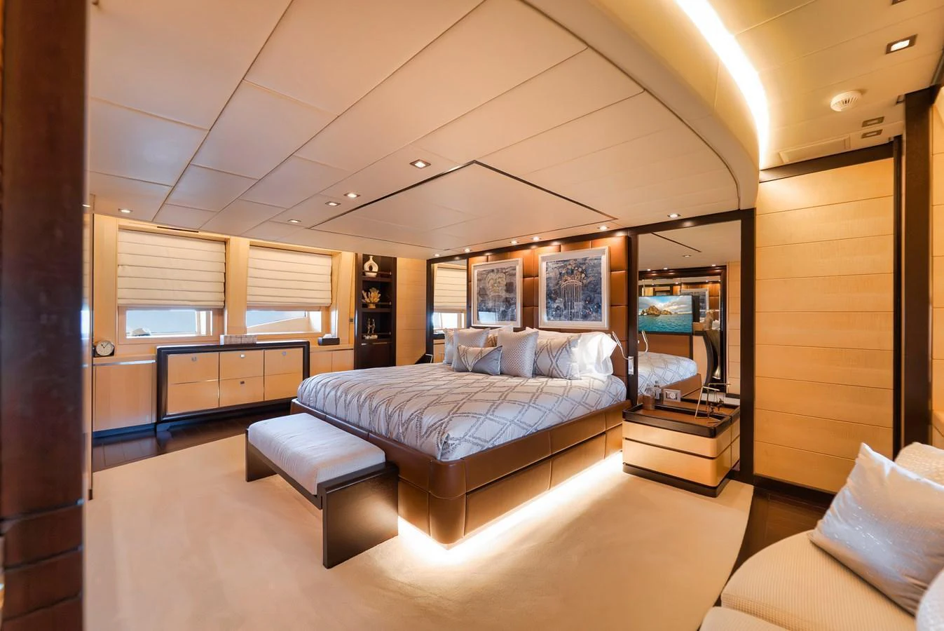The master stateroom offers a spacious and luxurious retreat with elegant furnishings and ambient lighting. aboard BET ON IT Yacht for Sale