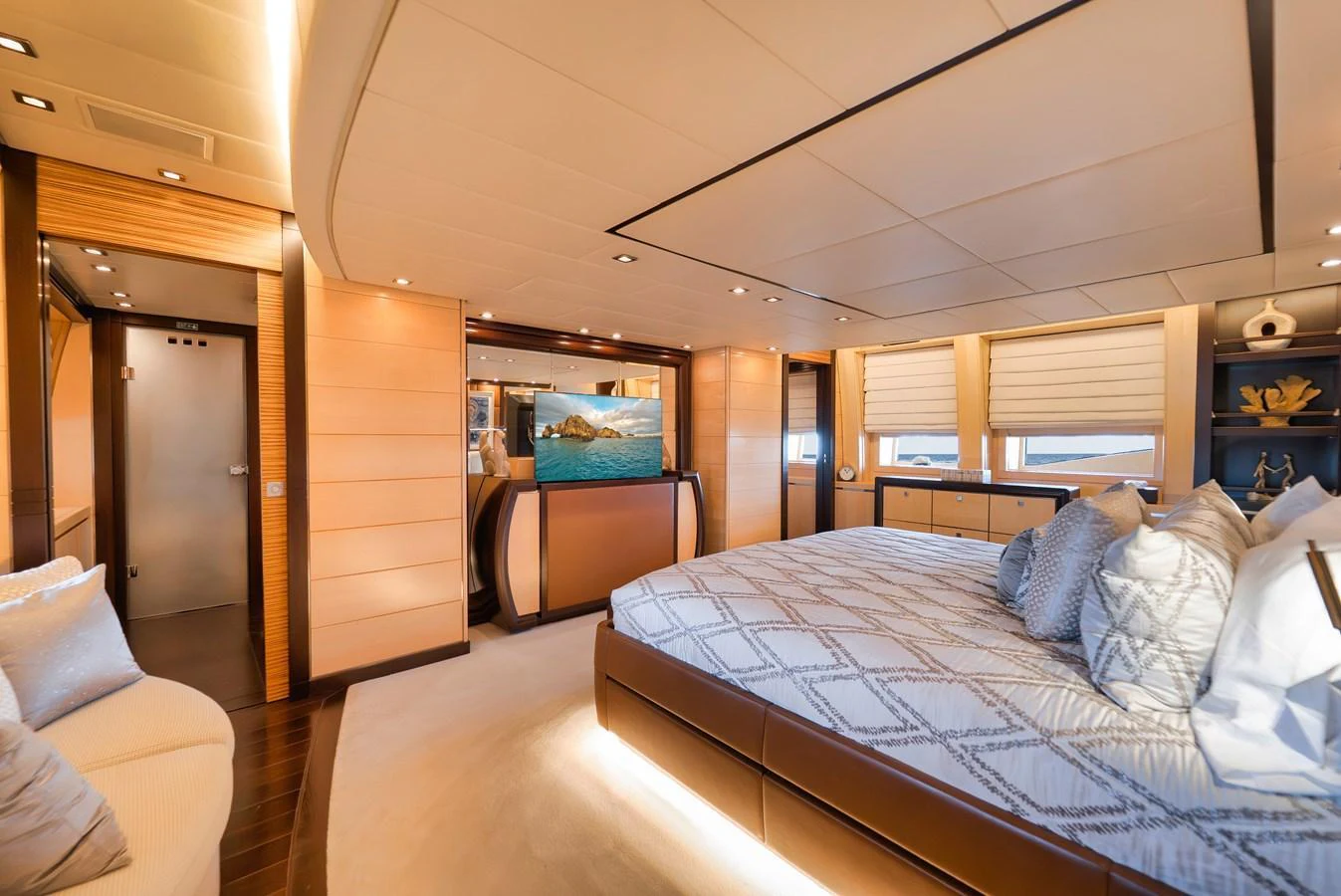The master stateroom exudes luxury with its spacious layout and elegant decor. aboard BET ON IT Yacht for Sale
