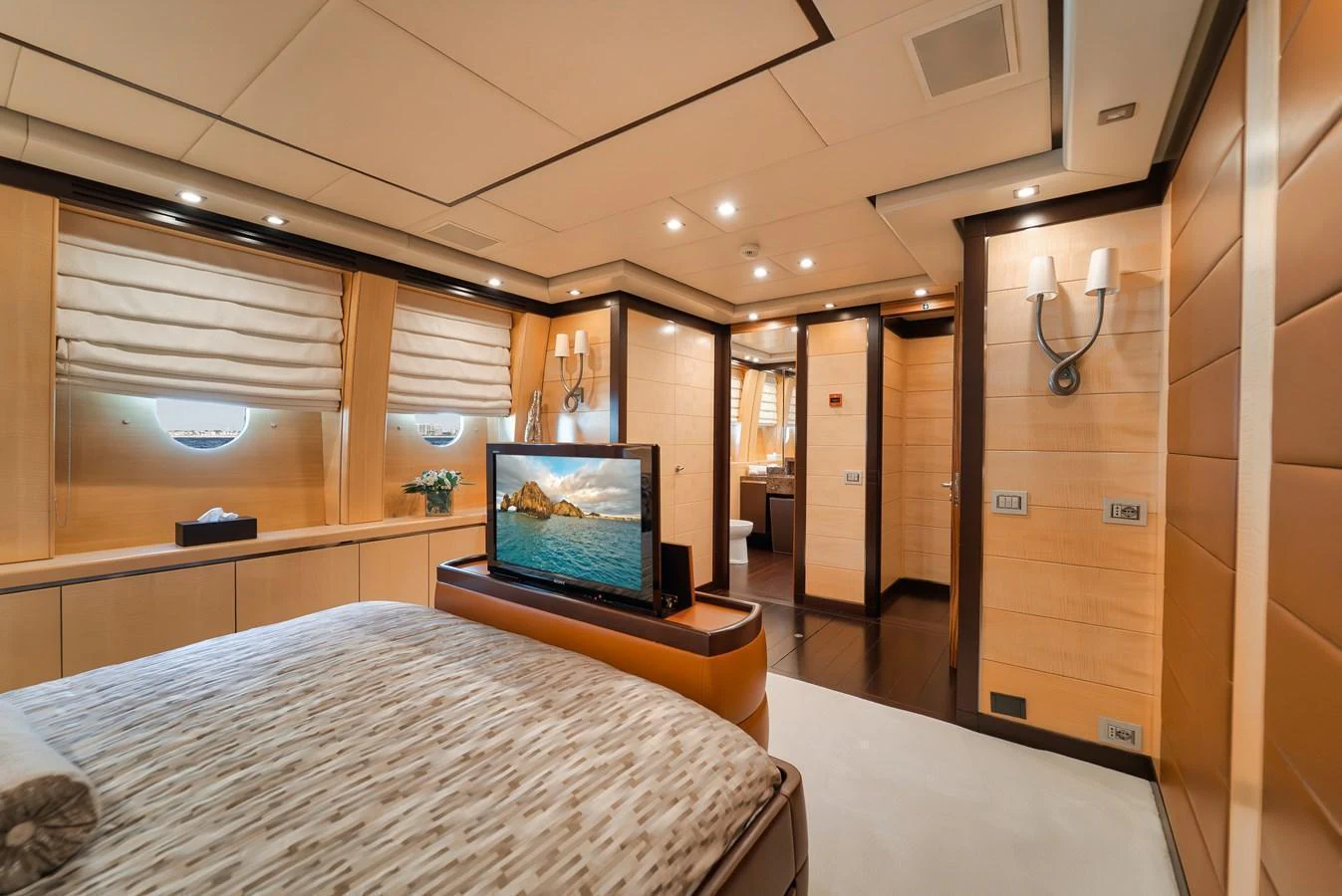 The master stateroom offers a luxurious retreat with elegant decor and modern amenities. aboard BET ON IT Yacht for Sale