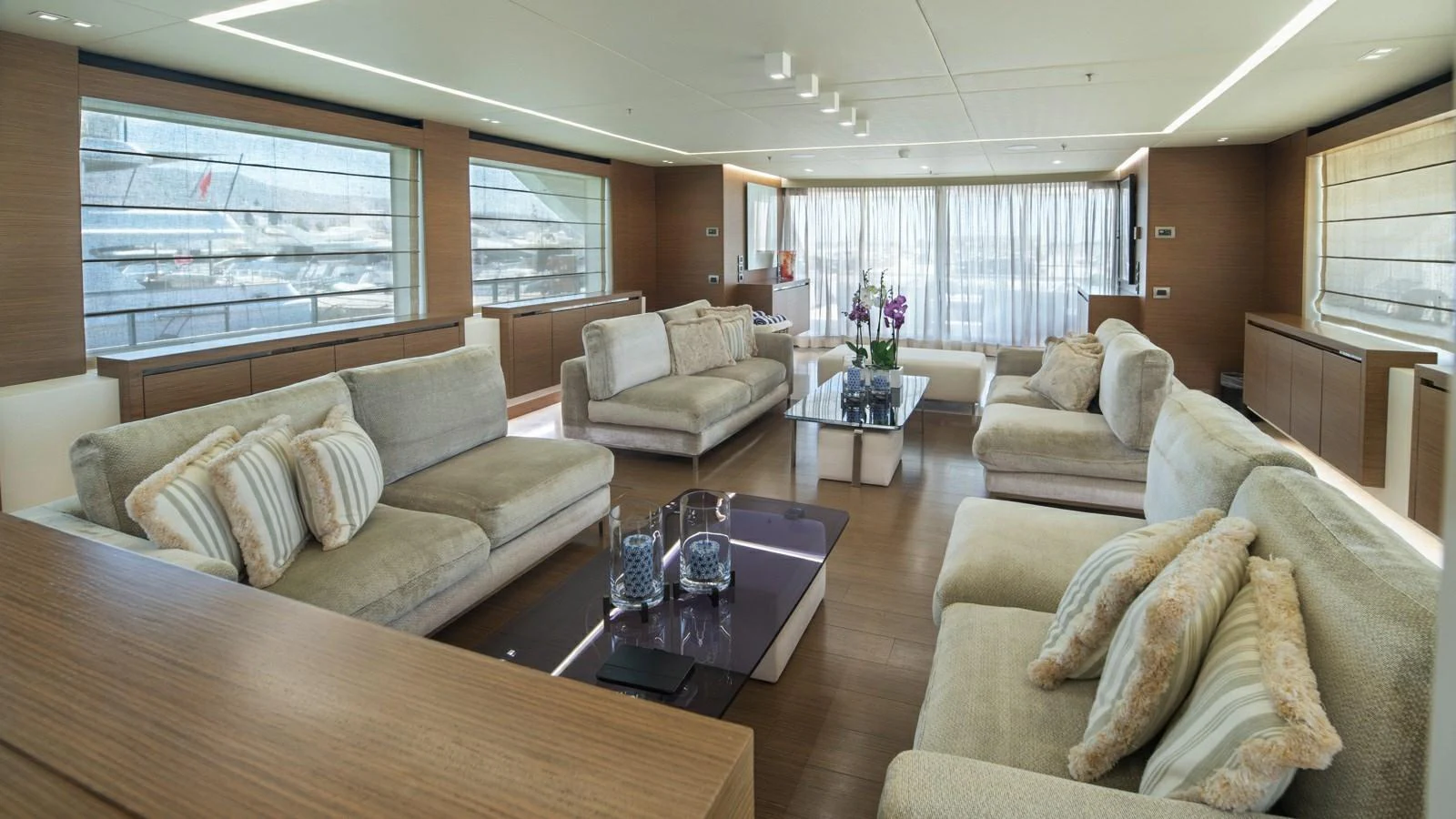 The spacious salon features plush seating and modern decor, offering a luxurious and comfortable environment. aboard IPANEMAS Yacht for Sale
