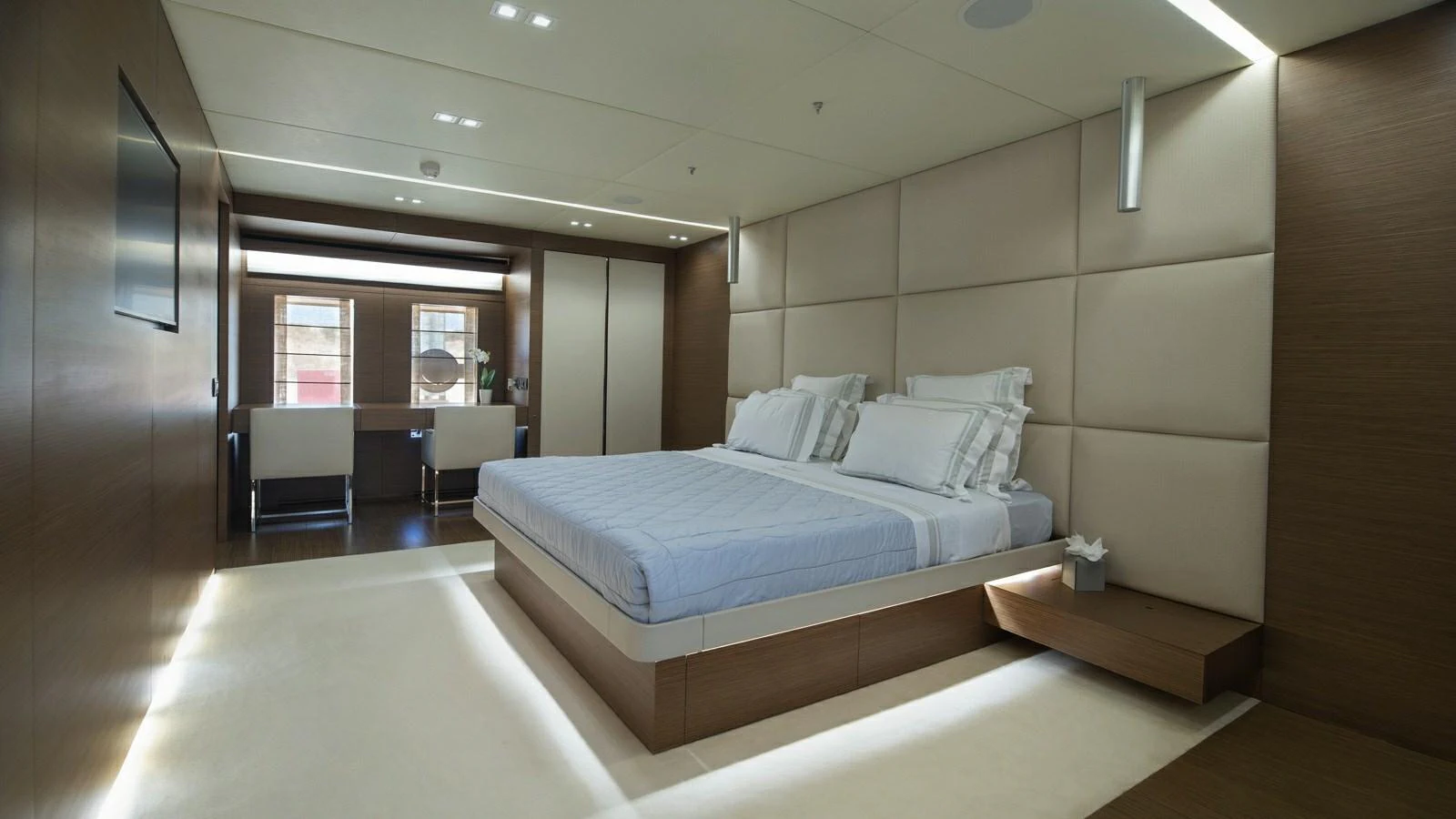 The master stateroom features a spacious bed, modern furnishings, and ample natural light. aboard IPANEMAS Yacht for Sale