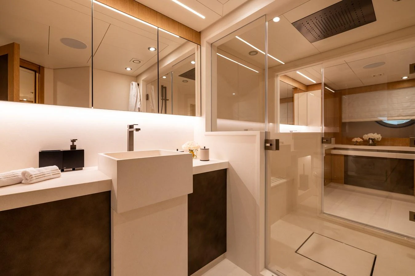 The yacht's bathroom features modern fixtures and a spacious, elegant design. aboard FIVE Yacht for Sale