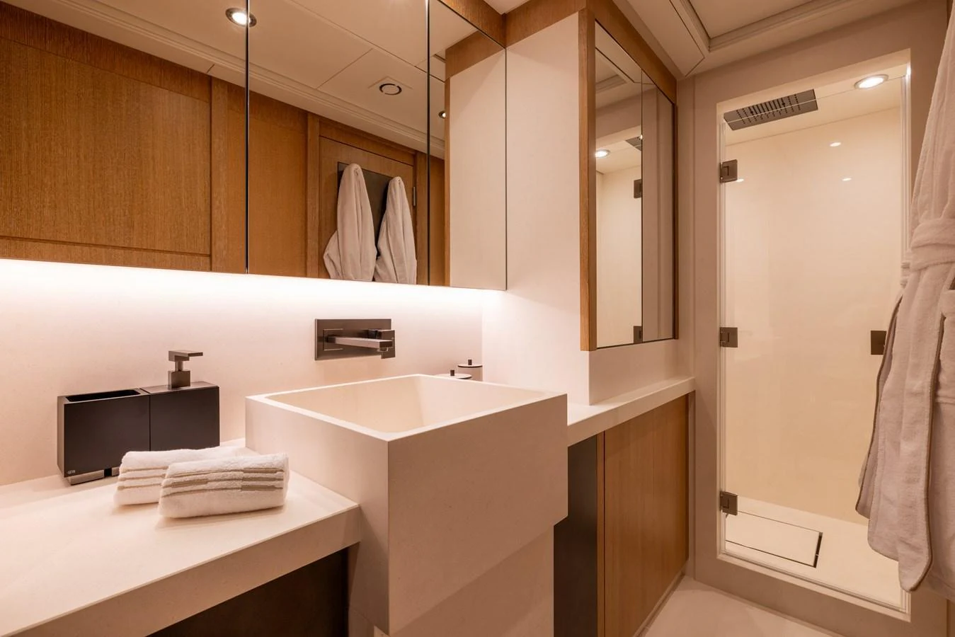 The yacht's bathroom features modern fixtures and a sleek design. aboard FIVE Yacht for Sale