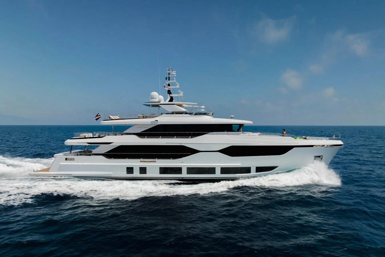 a white yacht on the water aboard MAJESTY 120 Yacht for Sale