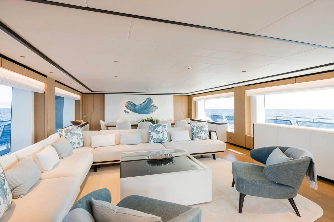 a living room with a couch and a table aboard MAJESTY 120 Yacht for Sale