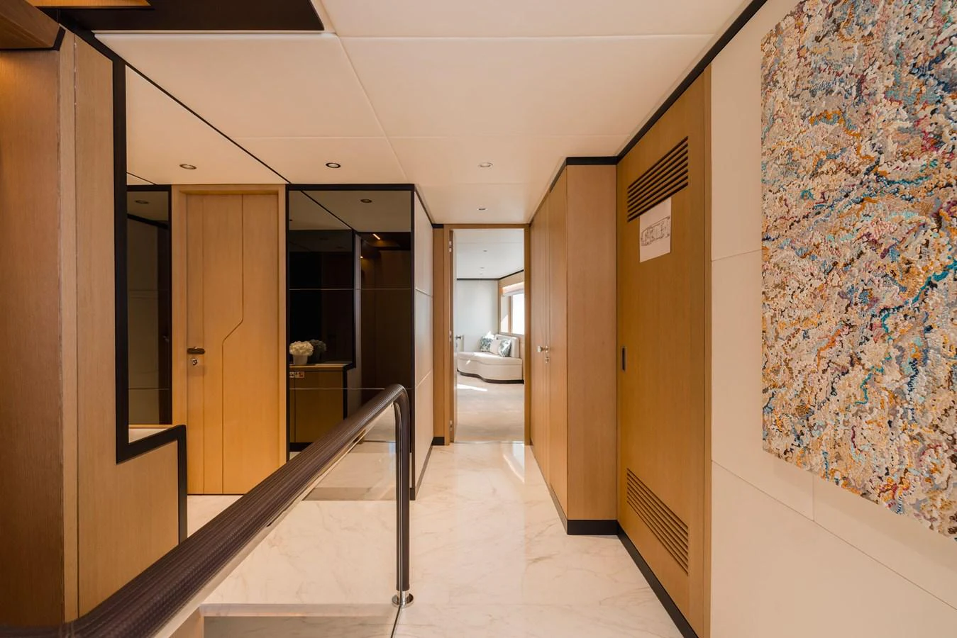 a hallway with doors aboard MAJESTY 120 Yacht for Sale