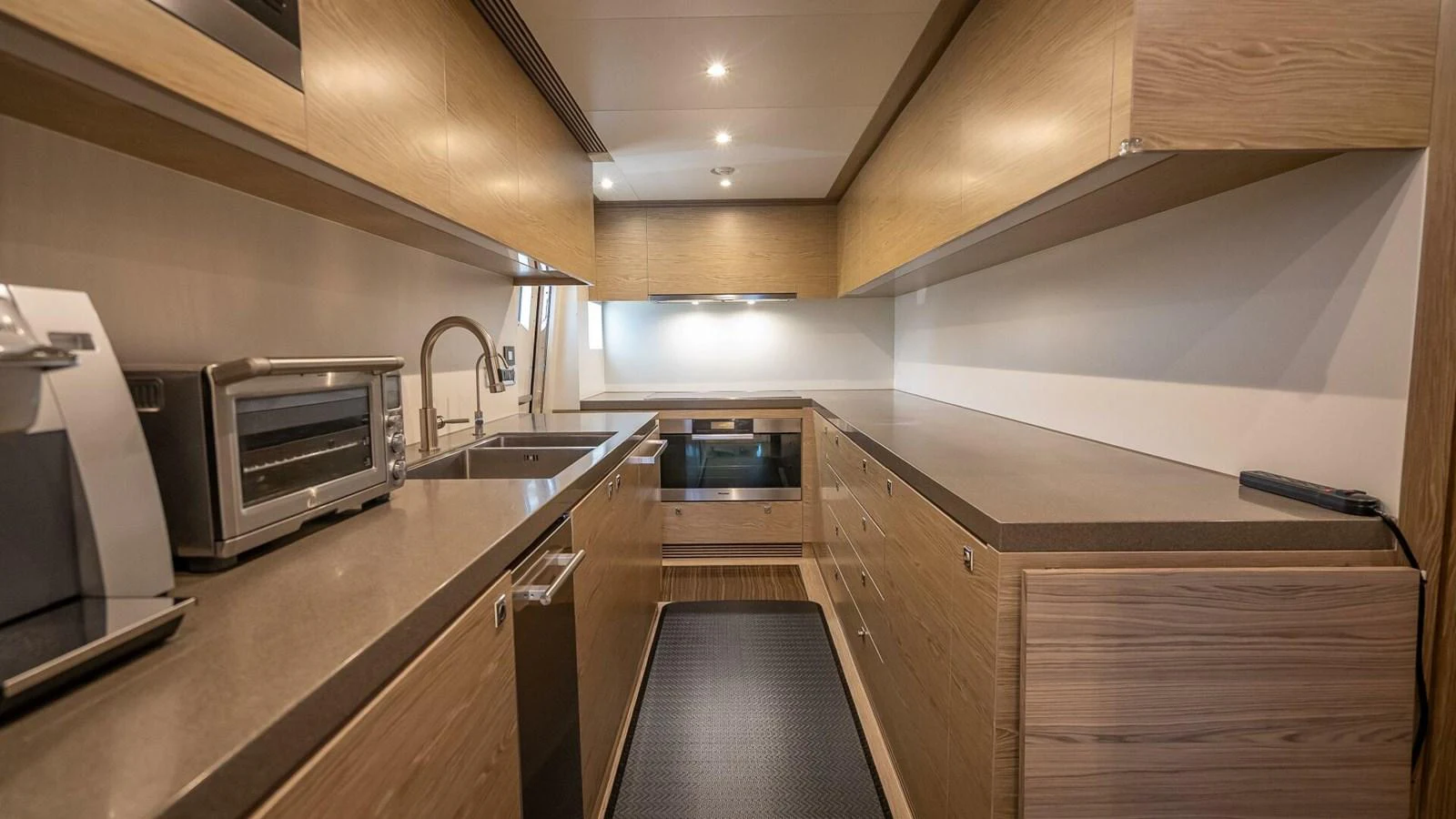 The galley features modern appliances and ample counter space for gourmet meal preparation. aboard SHORT STORY Yacht for Sale