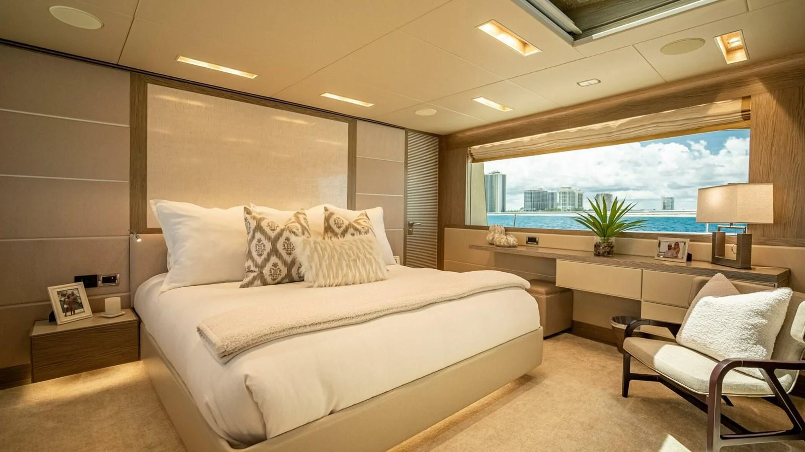 The master stateroom offers a luxurious and serene retreat with a large bed and expansive window views. aboard SHORT STORY Yacht for Sale