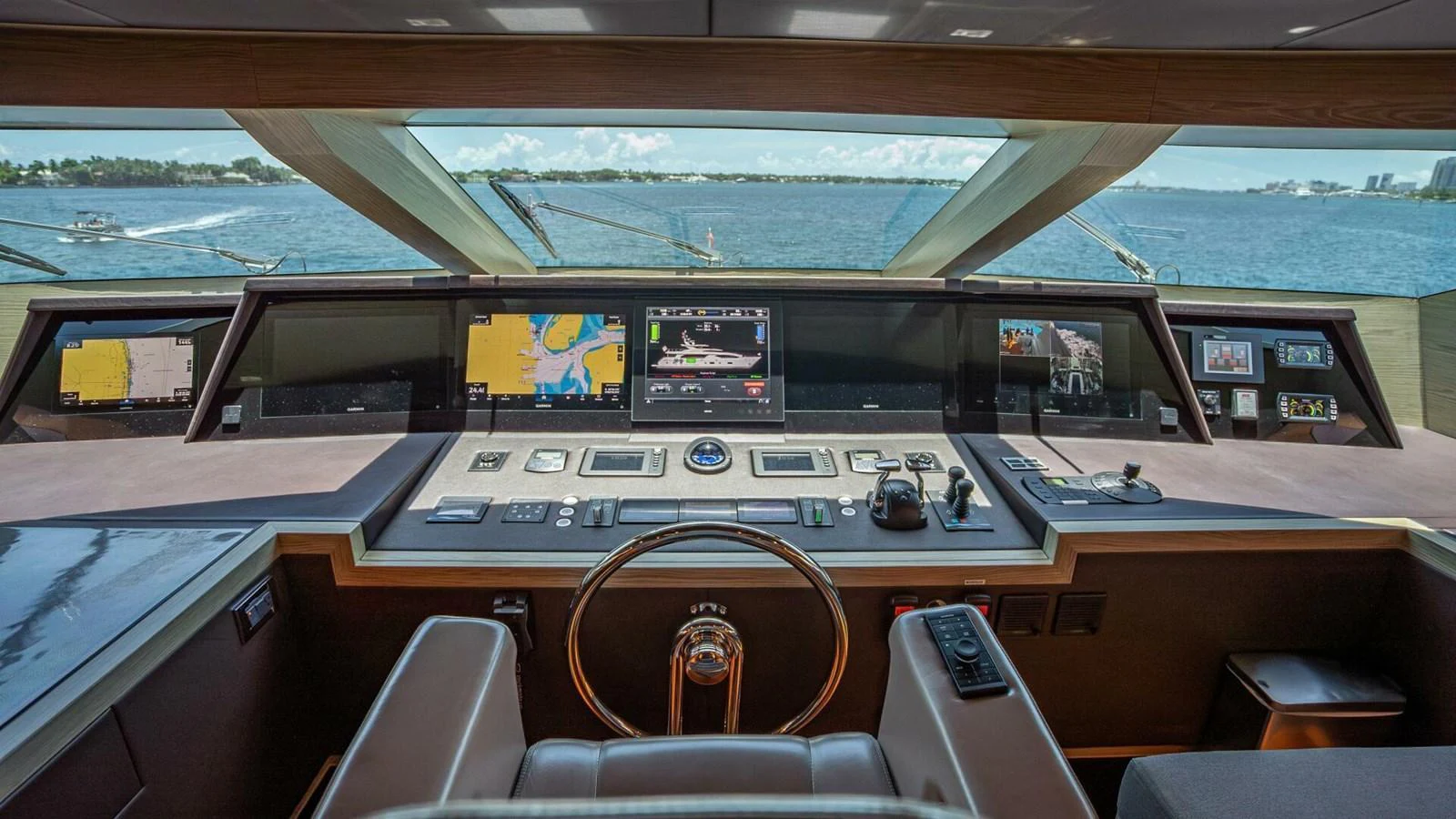 The helm station offers a commanding view with state-of-the-art navigation equipment and luxurious seating. aboard SHORT STORY Yacht for Sale