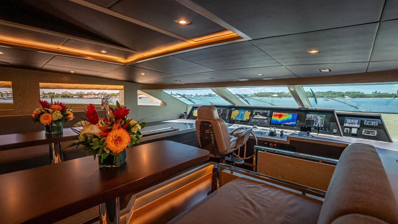 The helm of this yacht features state-of-the-art navigation equipment and luxurious seating with panoramic views. aboard SHORT STORY Yacht for Sale