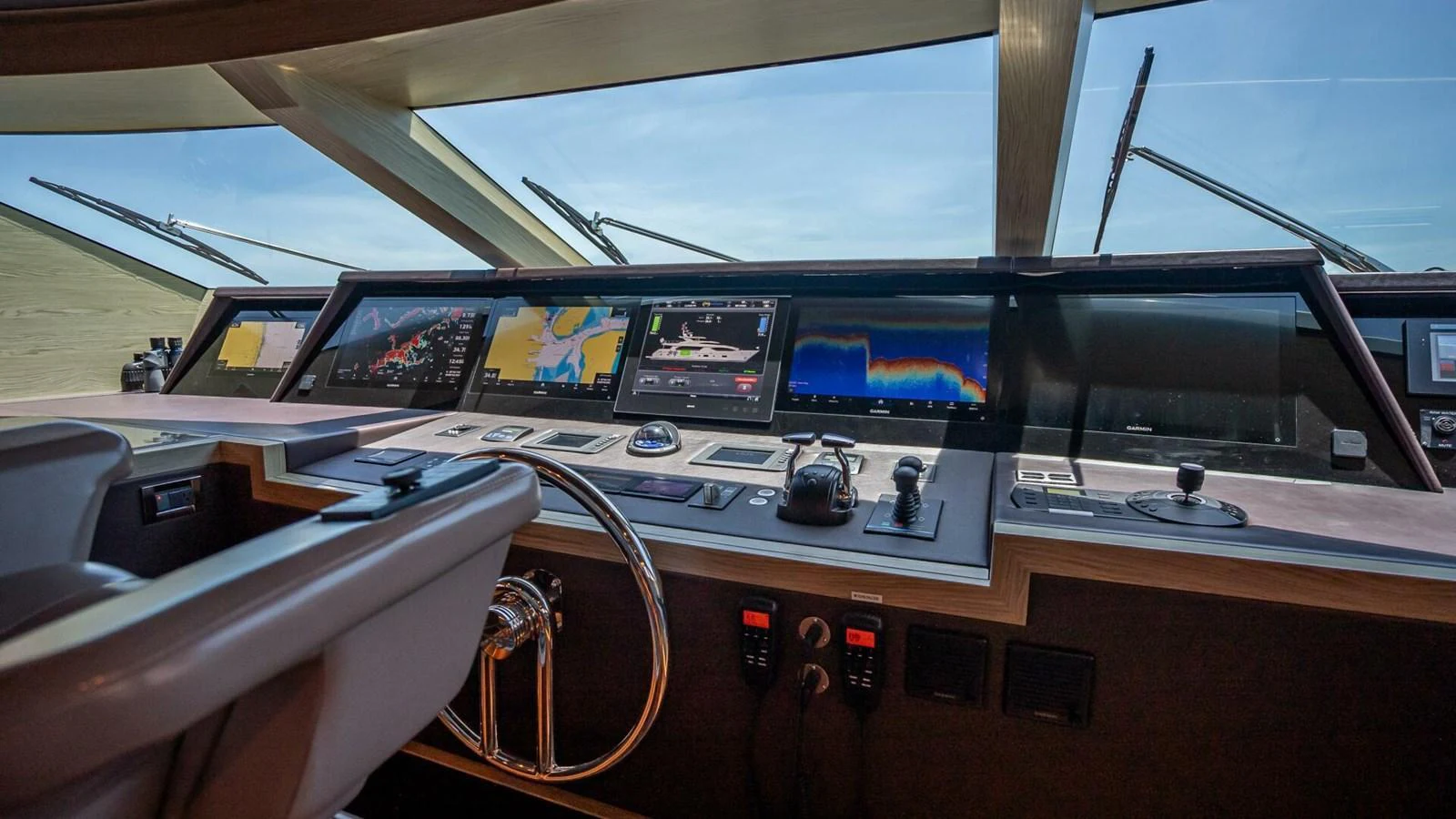 The helm station features advanced navigation and control systems with panoramic views. aboard SHORT STORY Yacht for Sale