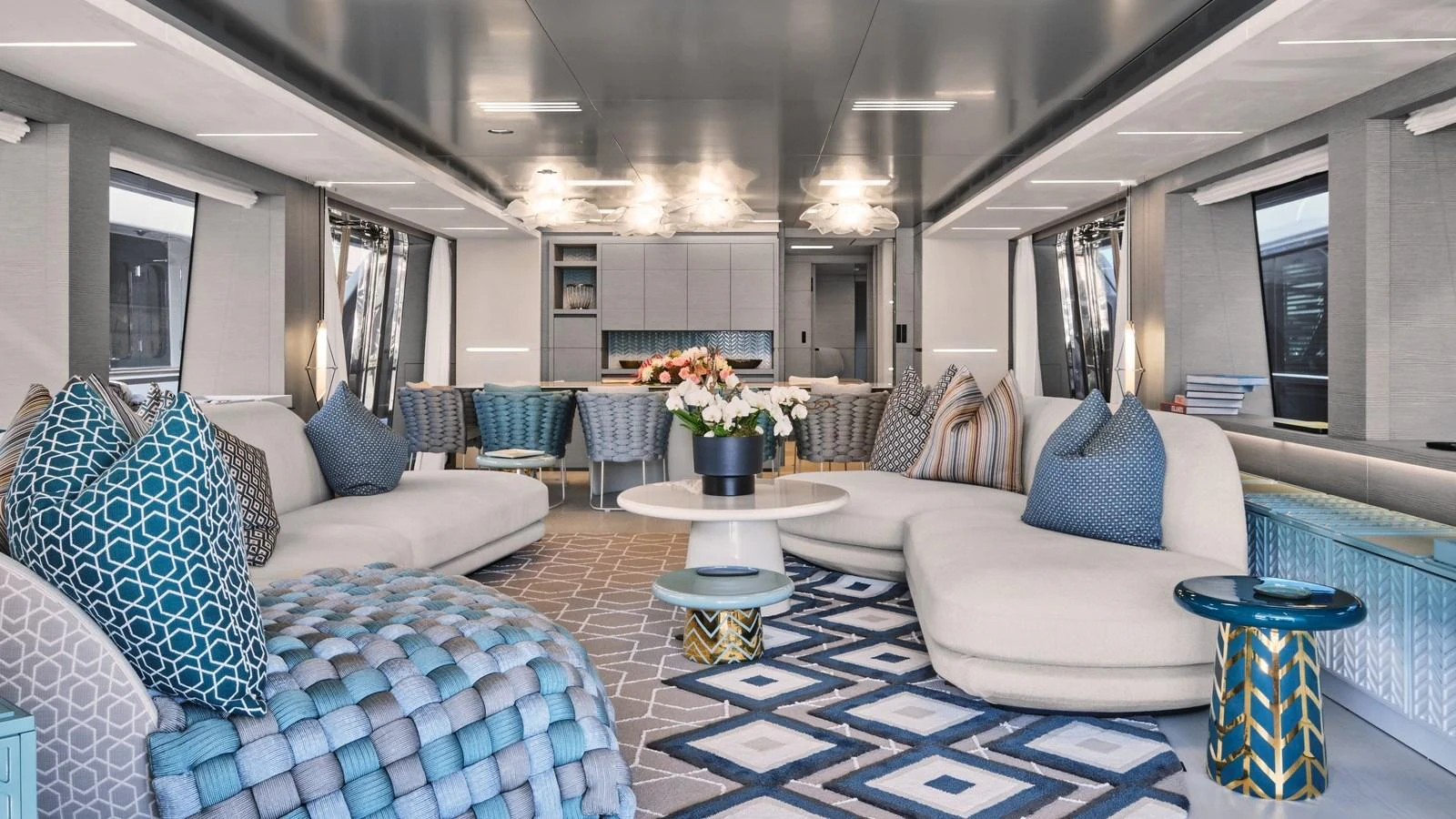 The salon features luxurious seating with a modern design and elegant decor. aboard BIZMAN Yacht for Sale