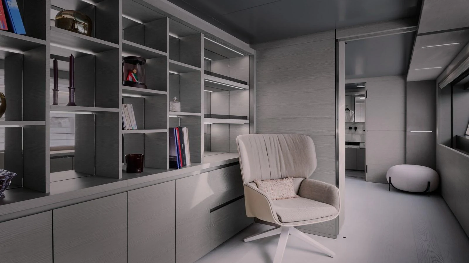 A modern and stylish lounge area with a comfortable chair and built-in shelving. aboard BIZMAN Yacht for Sale