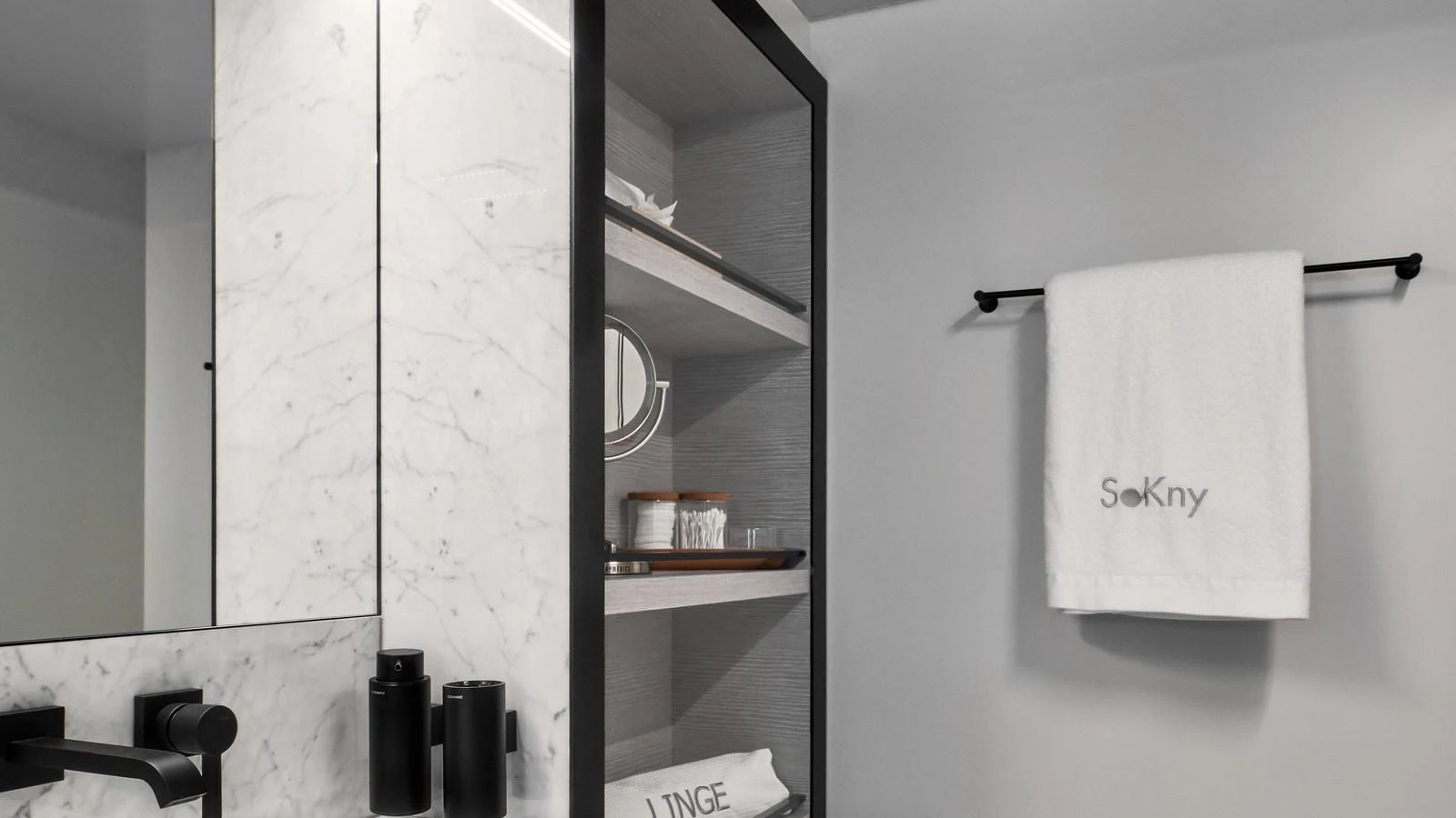 A sleek and modern yacht bathroom with marble accents and elegant fixtures. aboard BIZMAN Yacht for Sale
