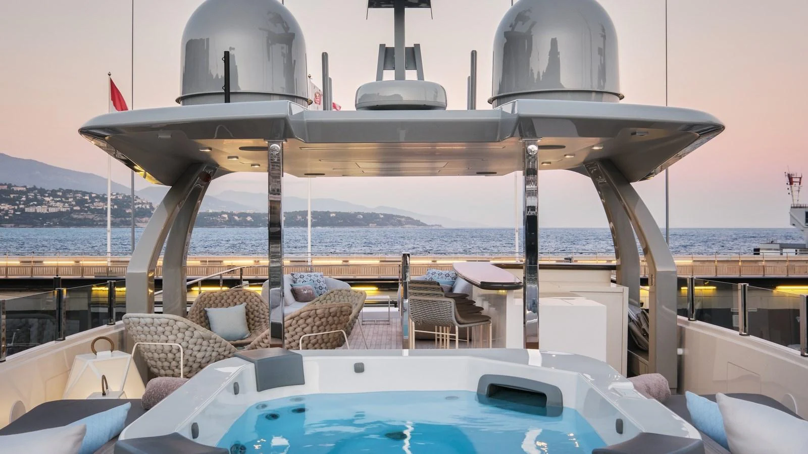 The sundeck features a luxurious jacuzzi with stunning views of the surrounding waters. aboard BIZMAN Yacht for Sale