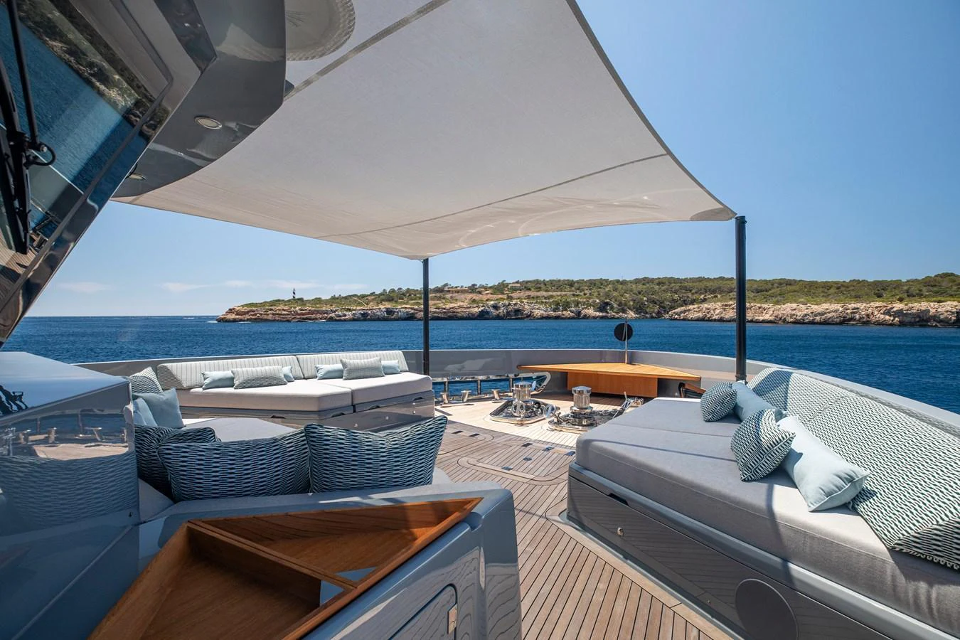 The sundeck offers luxurious lounging areas with stunning views of the surrounding waters. aboard OSCAR Yacht for Sale