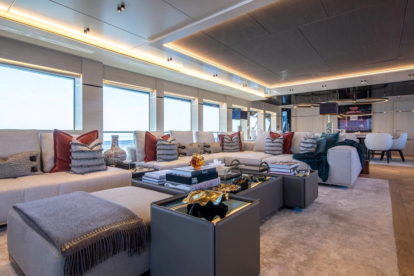 The spacious salon features luxurious seating and modern decor, offering a comfortable and elegant environment. aboard OSCAR Yacht for Sale