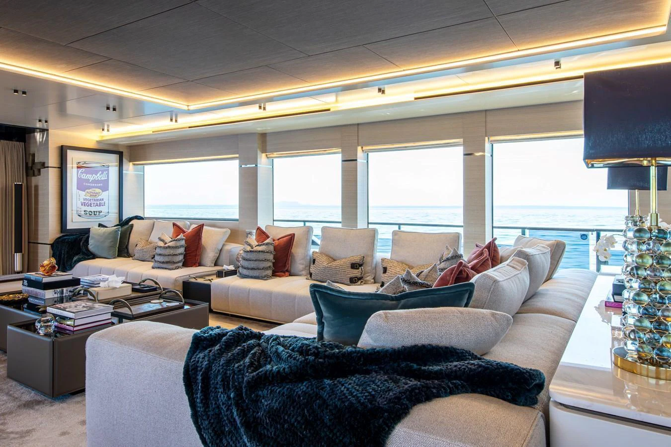 The salon offers a spacious and luxurious seating area with panoramic views. aboard OSCAR Yacht for Sale