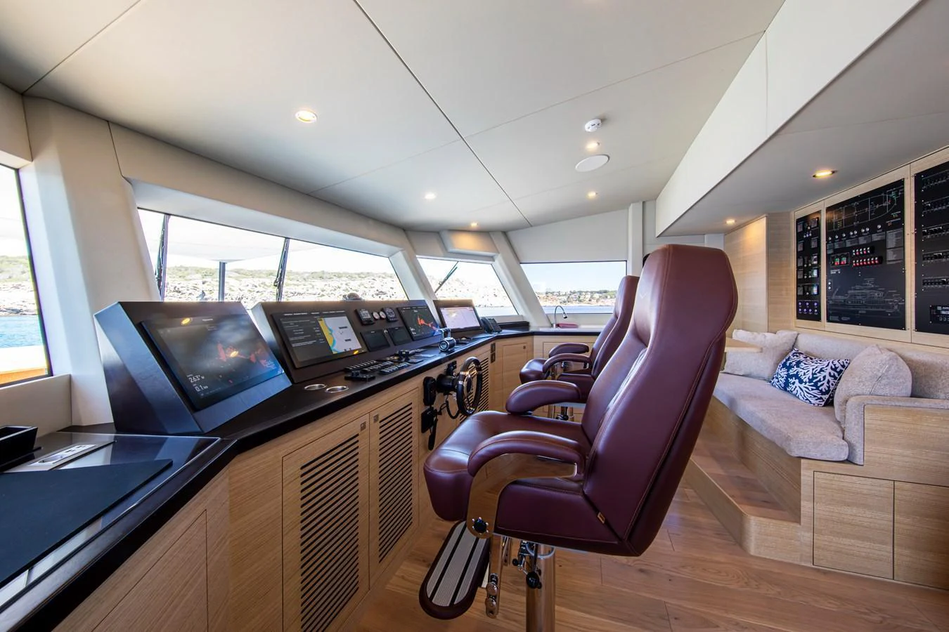 The helm station features state-of-the-art navigation equipment and luxurious seating with panoramic views. aboard OSCAR Yacht for Sale
