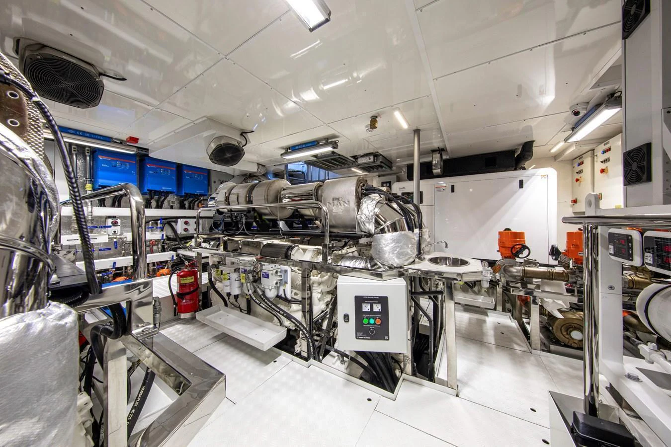 The engine room is equipped with advanced machinery and pristine stainless steel components. aboard OSCAR Yacht for Sale