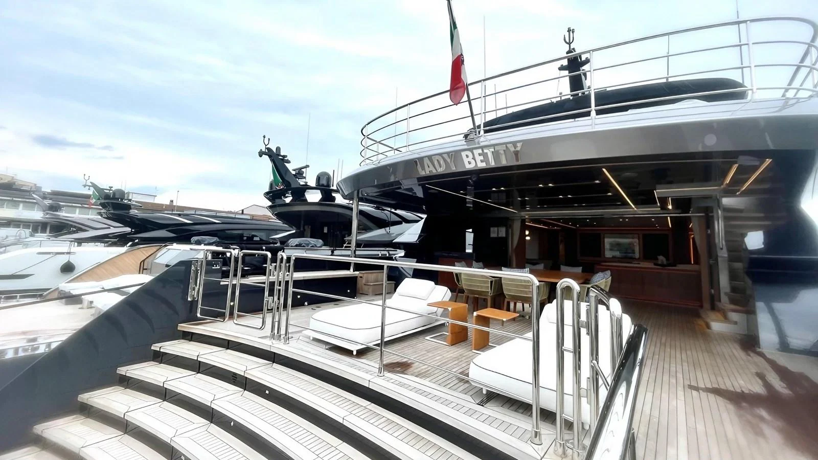 The aft deck of the yacht features luxurious lounging areas and a spacious layout for relaxation. aboard LADY BETTY Yacht for Sale