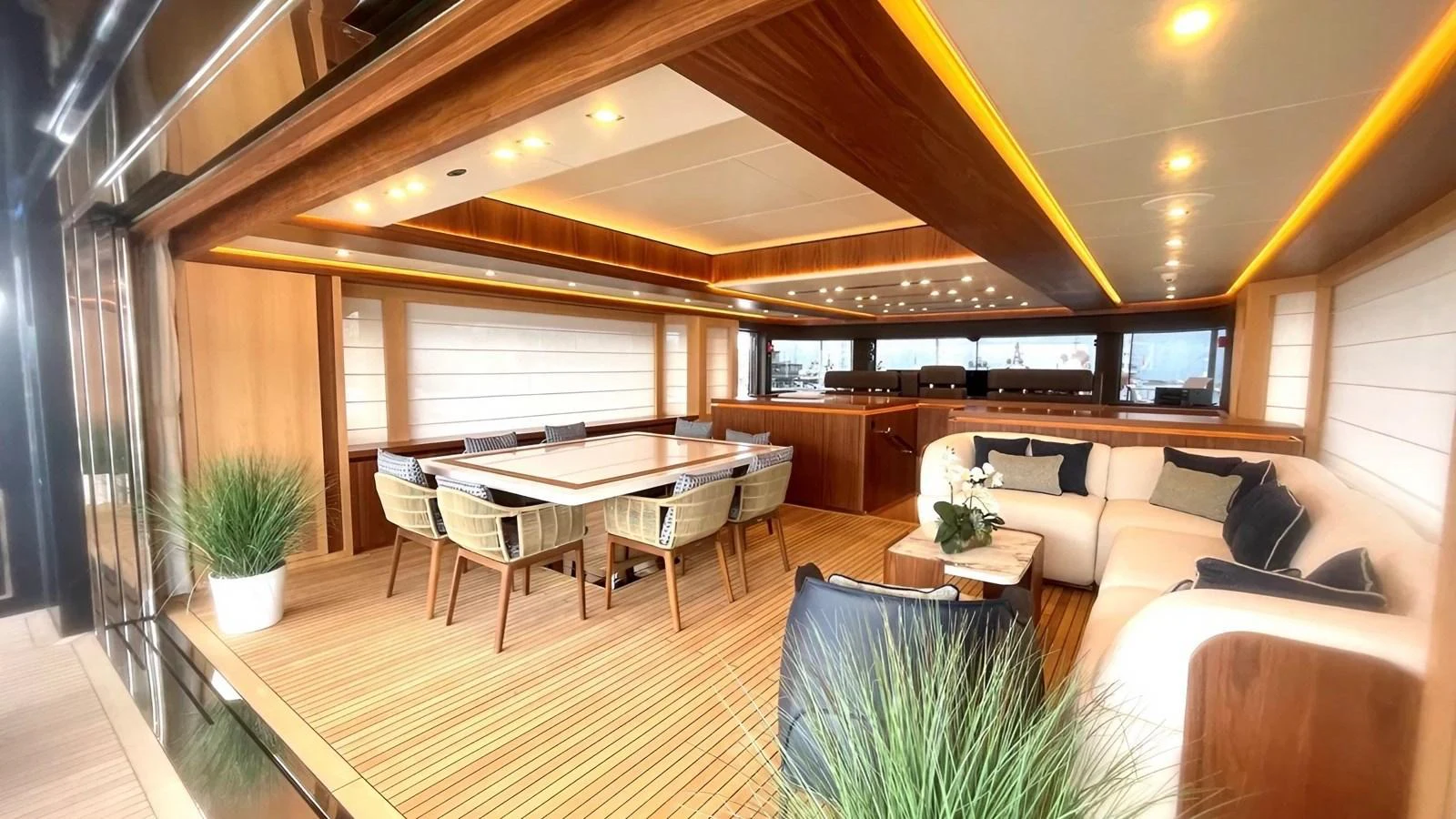 The yacht's salon features a spacious seating area with elegant furnishings and ample natural light. aboard LADY BETTY Yacht for Sale