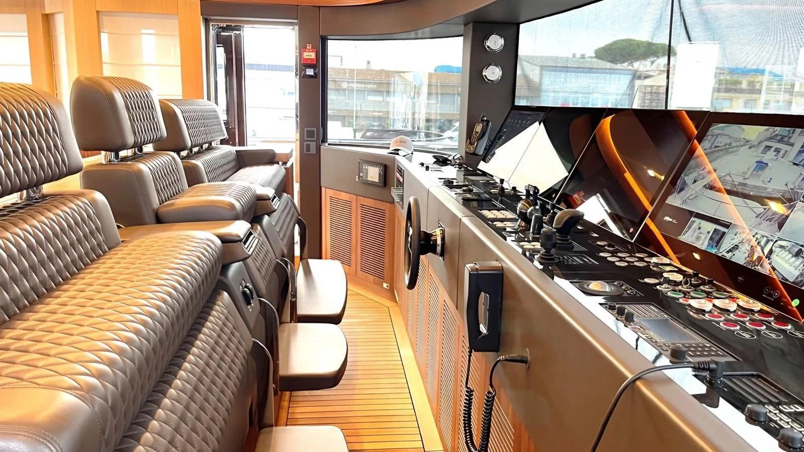 The helm station features state-of-the-art navigation equipment and luxurious seating. aboard LADY BETTY Yacht for Sale