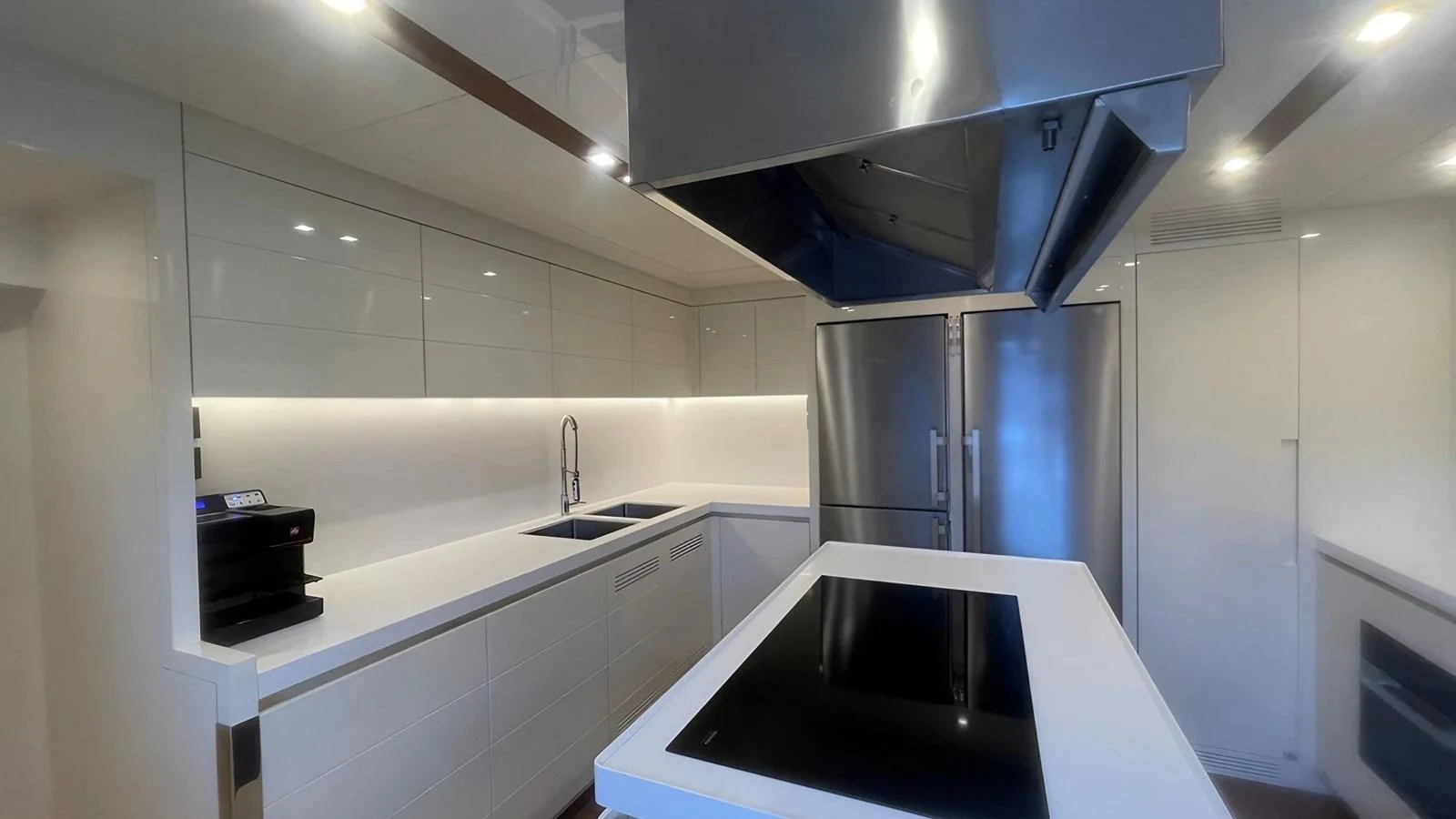 A modern galley with sleek appliances and ample counter space. aboard LADY BETTY Yacht for Sale