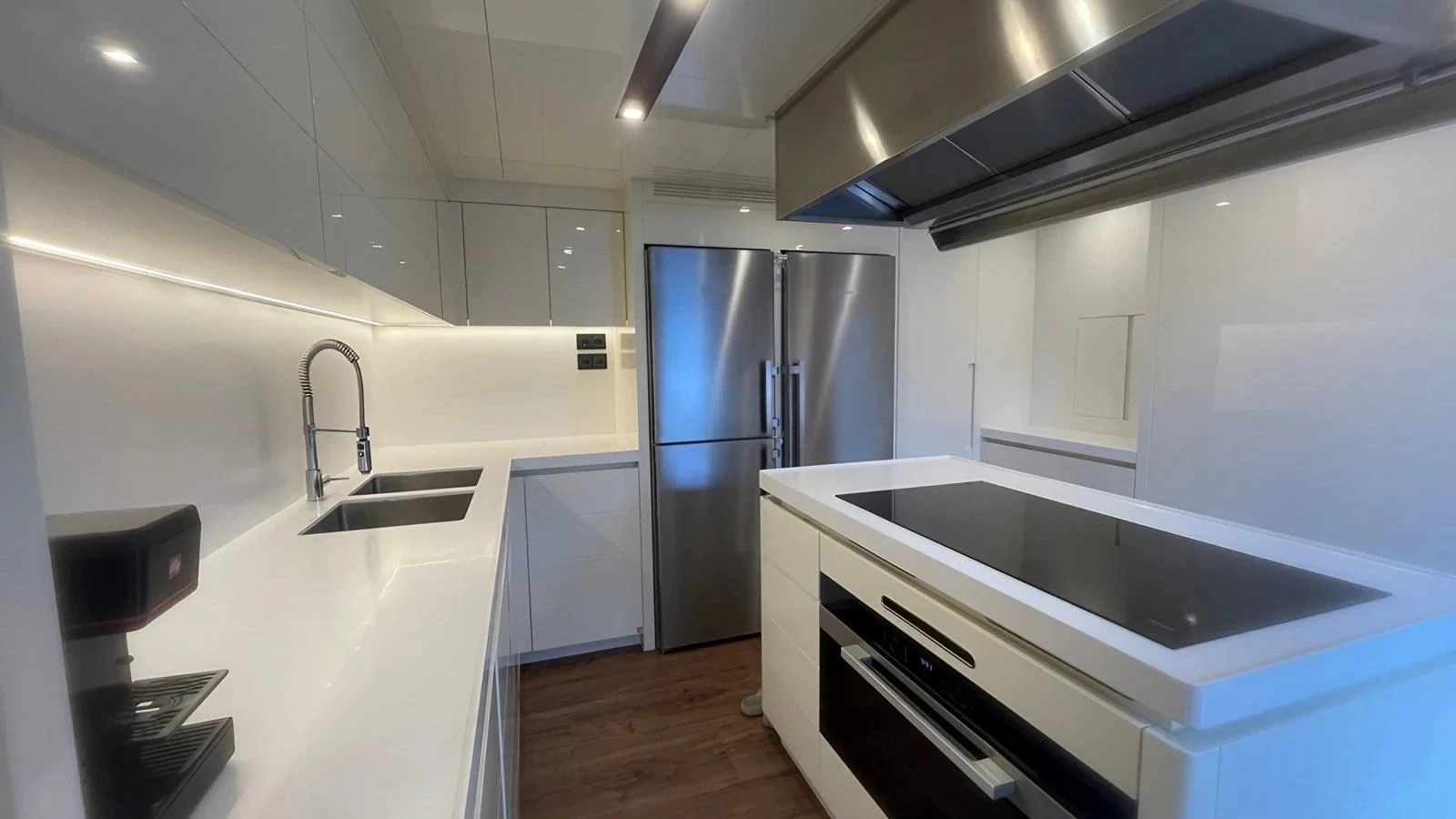 The modern galley features sleek appliances and ample counter space. aboard LADY BETTY Yacht for Sale