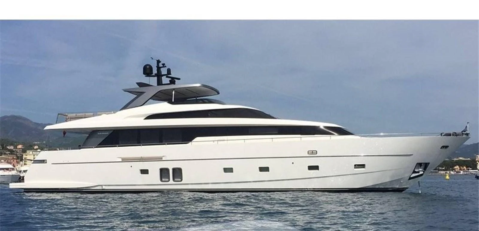 A sleek and modern yacht glides gracefully on calm waters, showcasing its elegant design. aboard SL94 Yacht for Sale