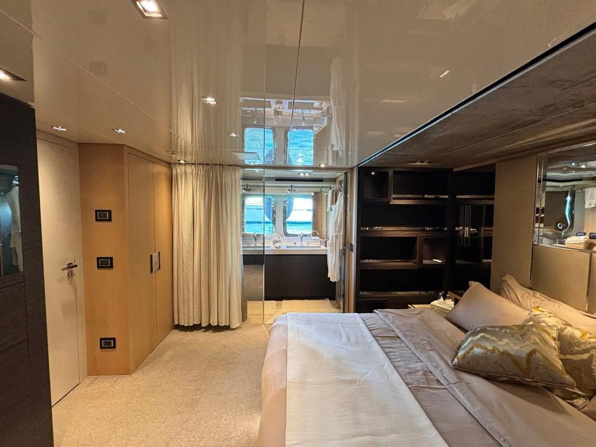 The master stateroom offers a luxurious and spacious retreat with elegant decor and ample natural light. aboard SL94 Yacht for Sale