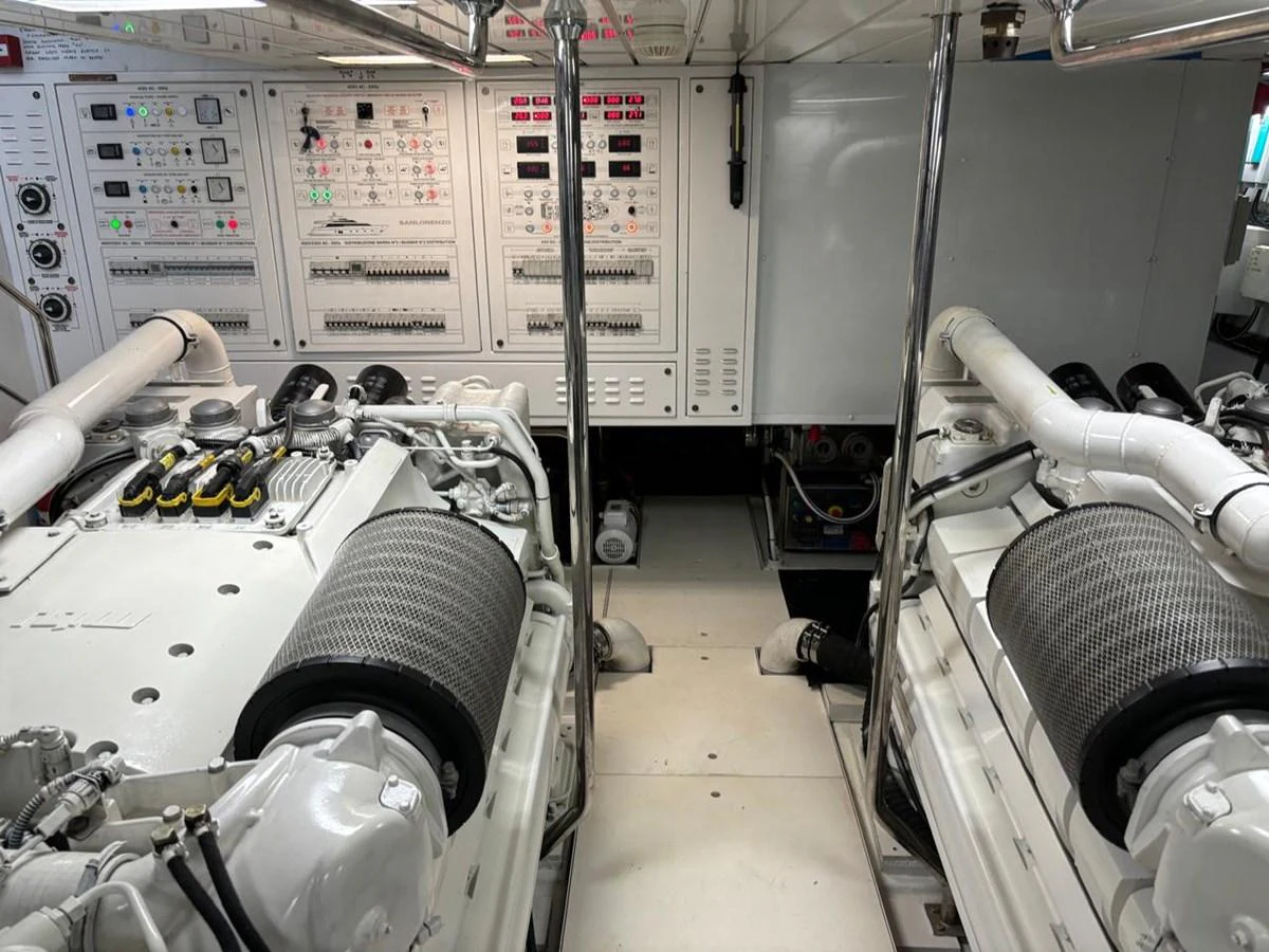 The engine room showcases advanced machinery and control panels, highlighting the yacht's engineering excellence. aboard SL94 Yacht for Sale