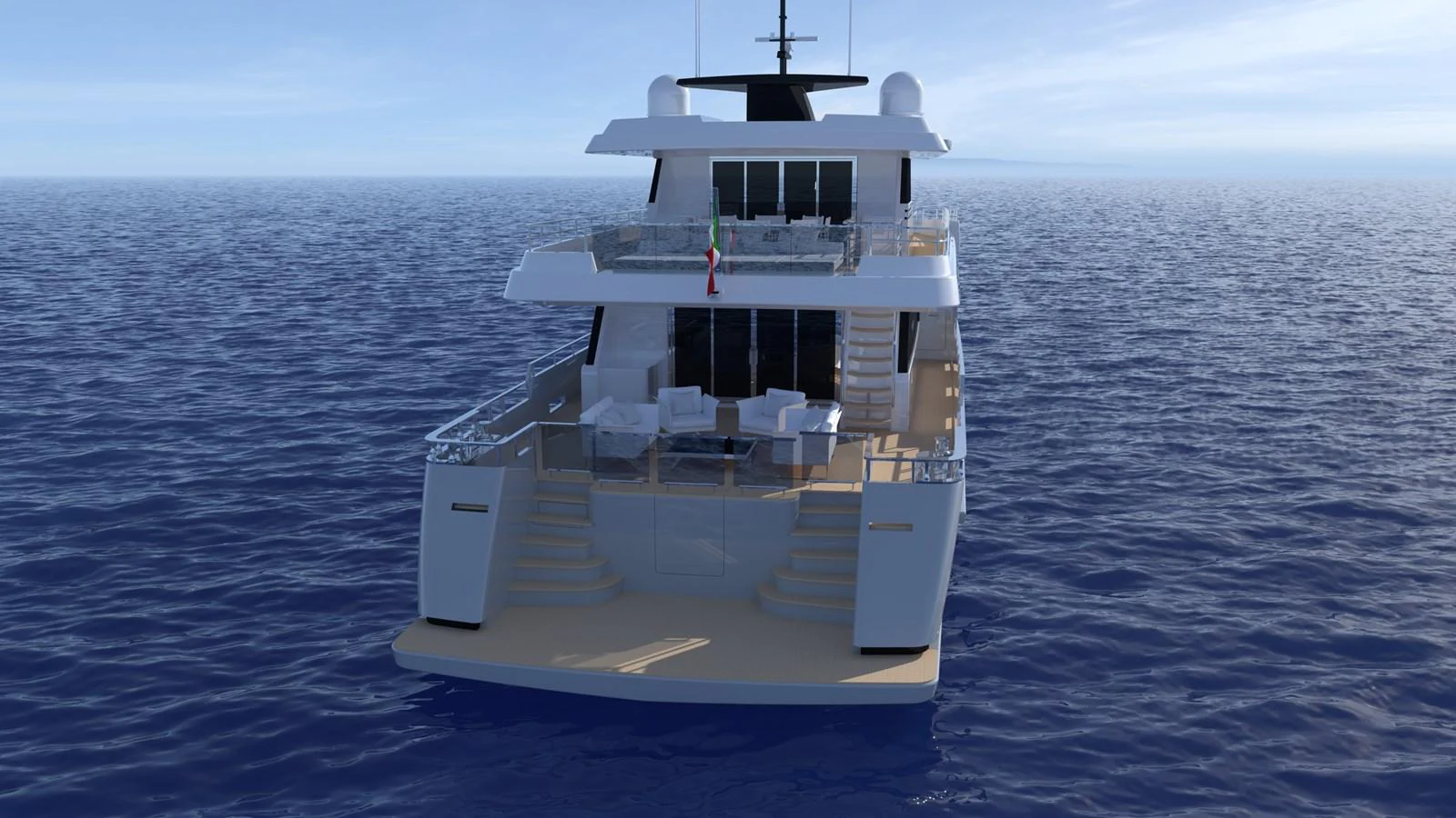 A luxurious yacht is seen from the rear, showcasing its spacious decks and elegant design on the open sea. aboard WIDESPACE EXPLORER Yacht for Sale