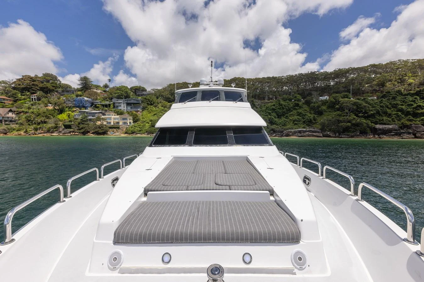 The yacht's foredeck features a spacious sunpad area, perfect for relaxation under the open sky. aboard SASSY Yacht for Sale