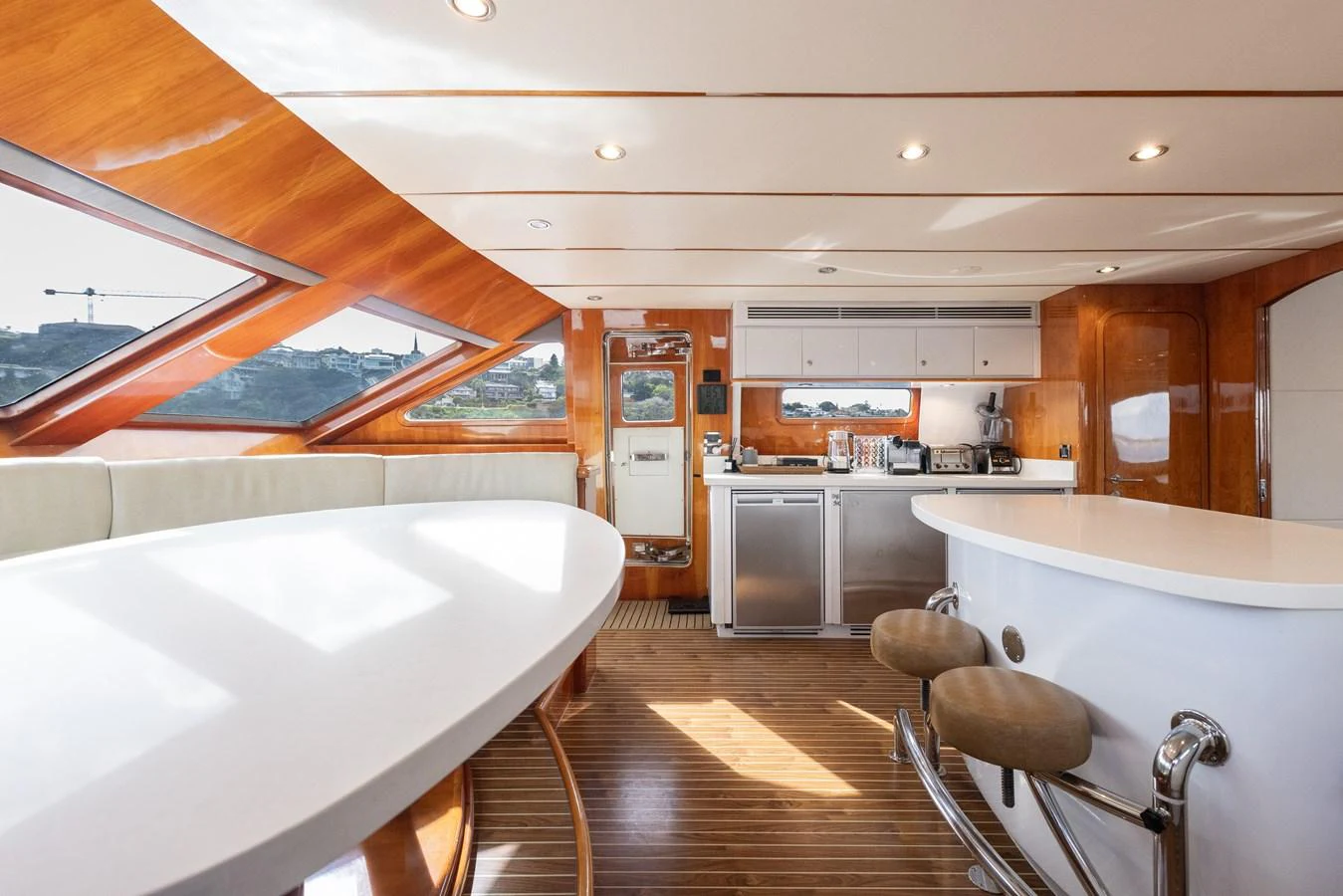 The yacht's galley features modern appliances and a sleek design with ample natural light. aboard SASSY Yacht for Sale