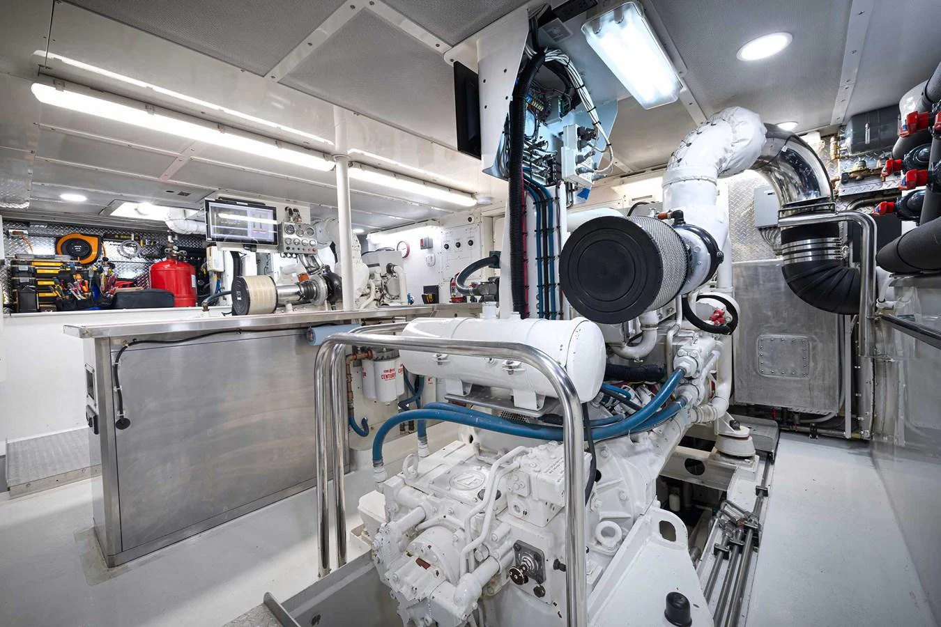 The image showcases the yacht's pristine and well-organized engine room. aboard HEAVEN'S GATE Yacht for Sale