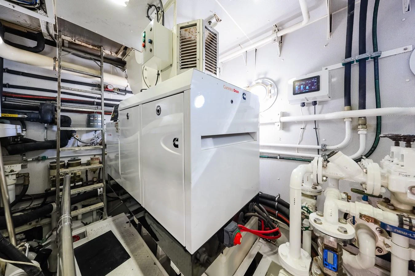 The image showcases the well-maintained engine room of the yacht, highlighting its advanced machinery and clean layout. aboard VICTORIA Yacht for Sale