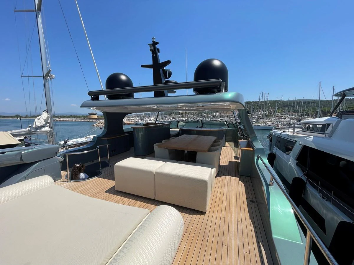 The flybridge offers a spacious and stylish area for relaxation and dining with panoramic views. aboard UNICA Yacht for Sale