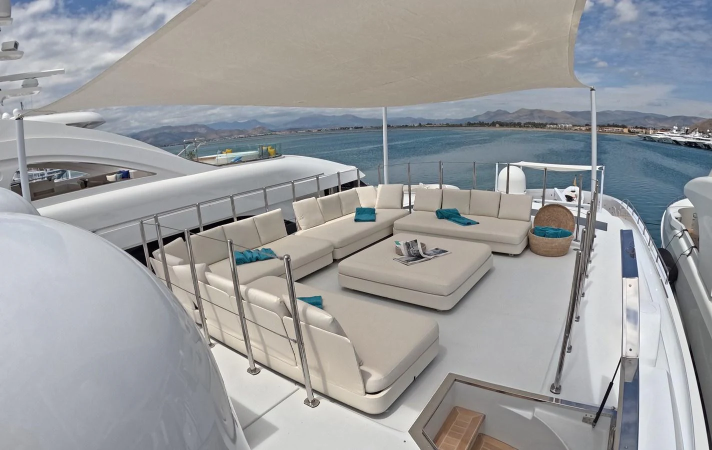 The sundeck offers a spacious lounging area with plush seating and panoramic views. aboard BARENTS SEA Yacht for Sale