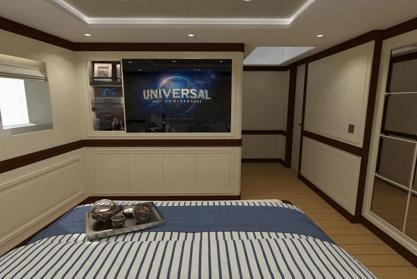 A luxurious stateroom featuring a large bed, a tray with refreshments, and a flat-screen TV. aboard MAGNOLIA II Yacht for Sale
