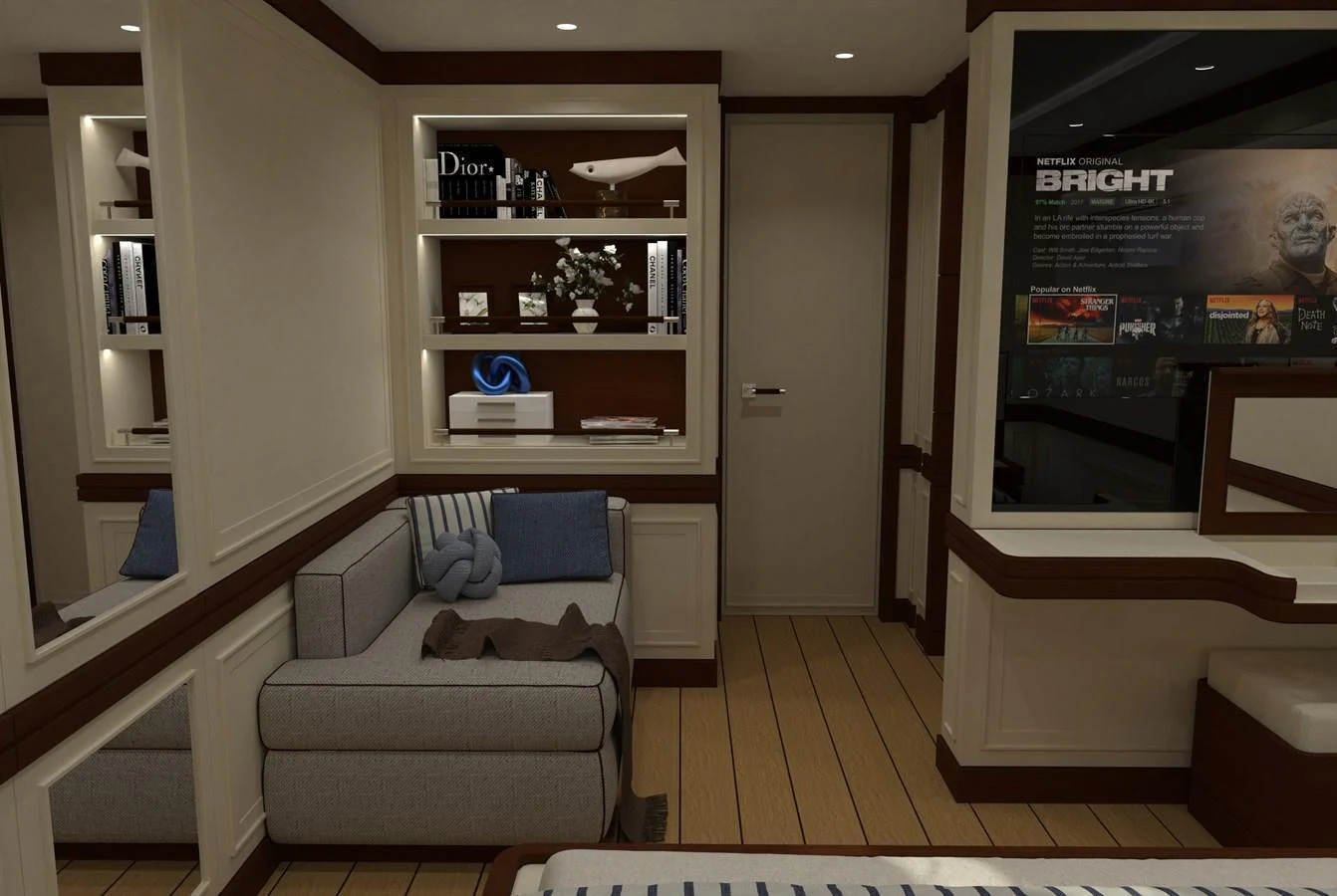 A cozy stateroom featuring a comfortable seating area and a well-organized bookshelf. aboard MAGNOLIA II Yacht for Sale