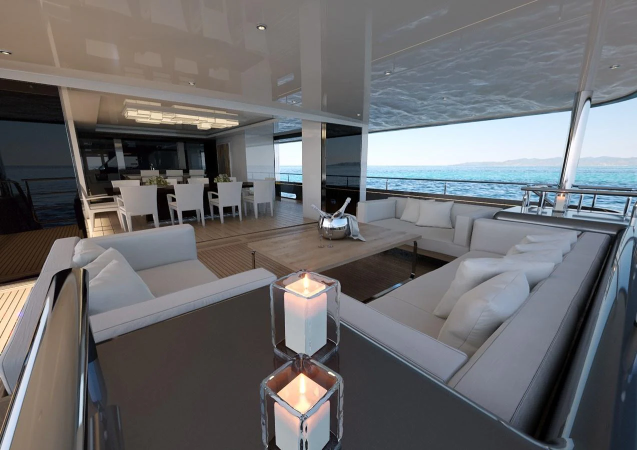 The aft deck features a spacious seating area with elegant decor and a stunning ocean view. aboard MAGNOLIA II Yacht for Sale
