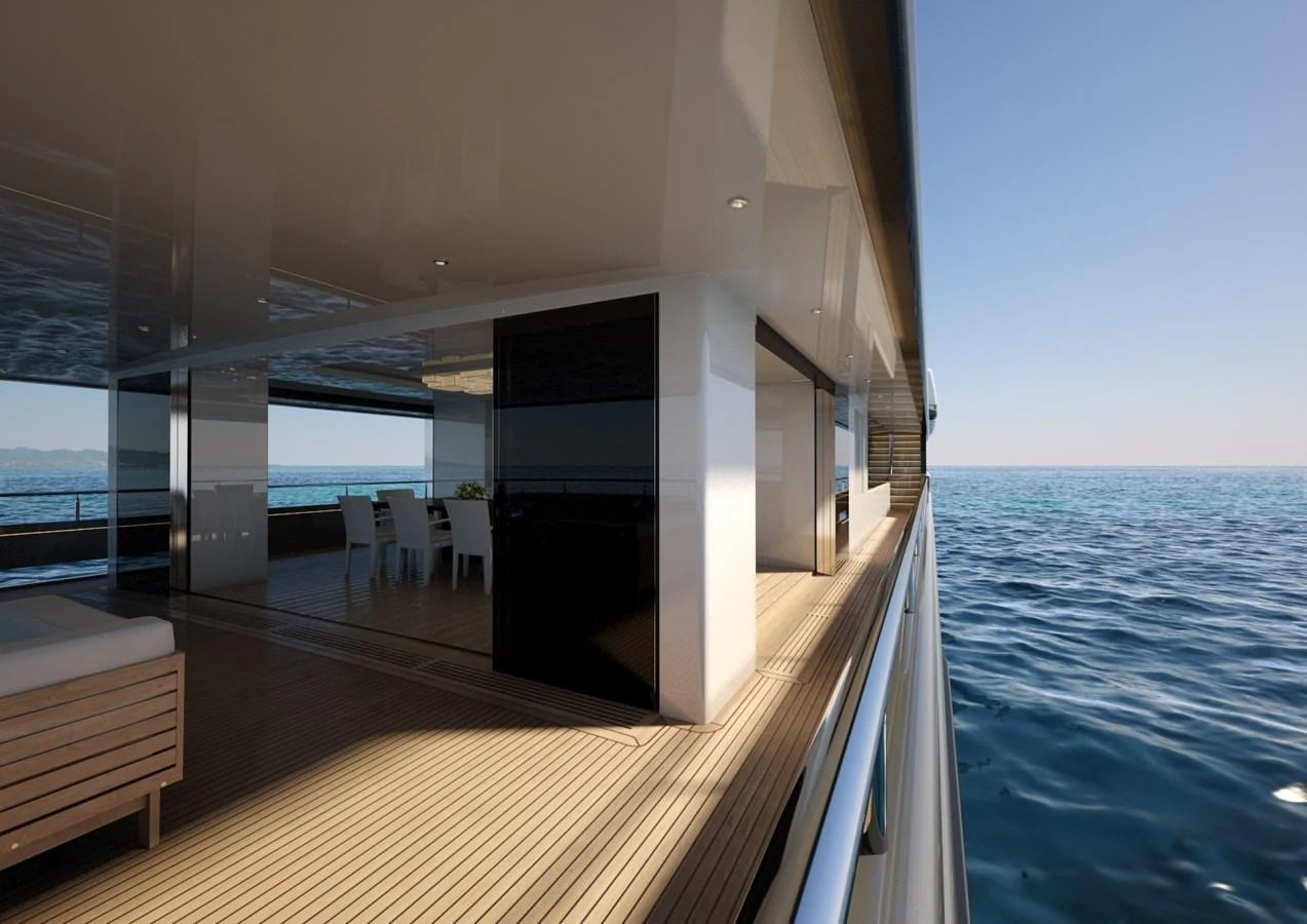 The yacht's deck offers a seamless transition between indoor and outdoor spaces with stunning ocean views. aboard MAGNOLIA II Yacht for Sale