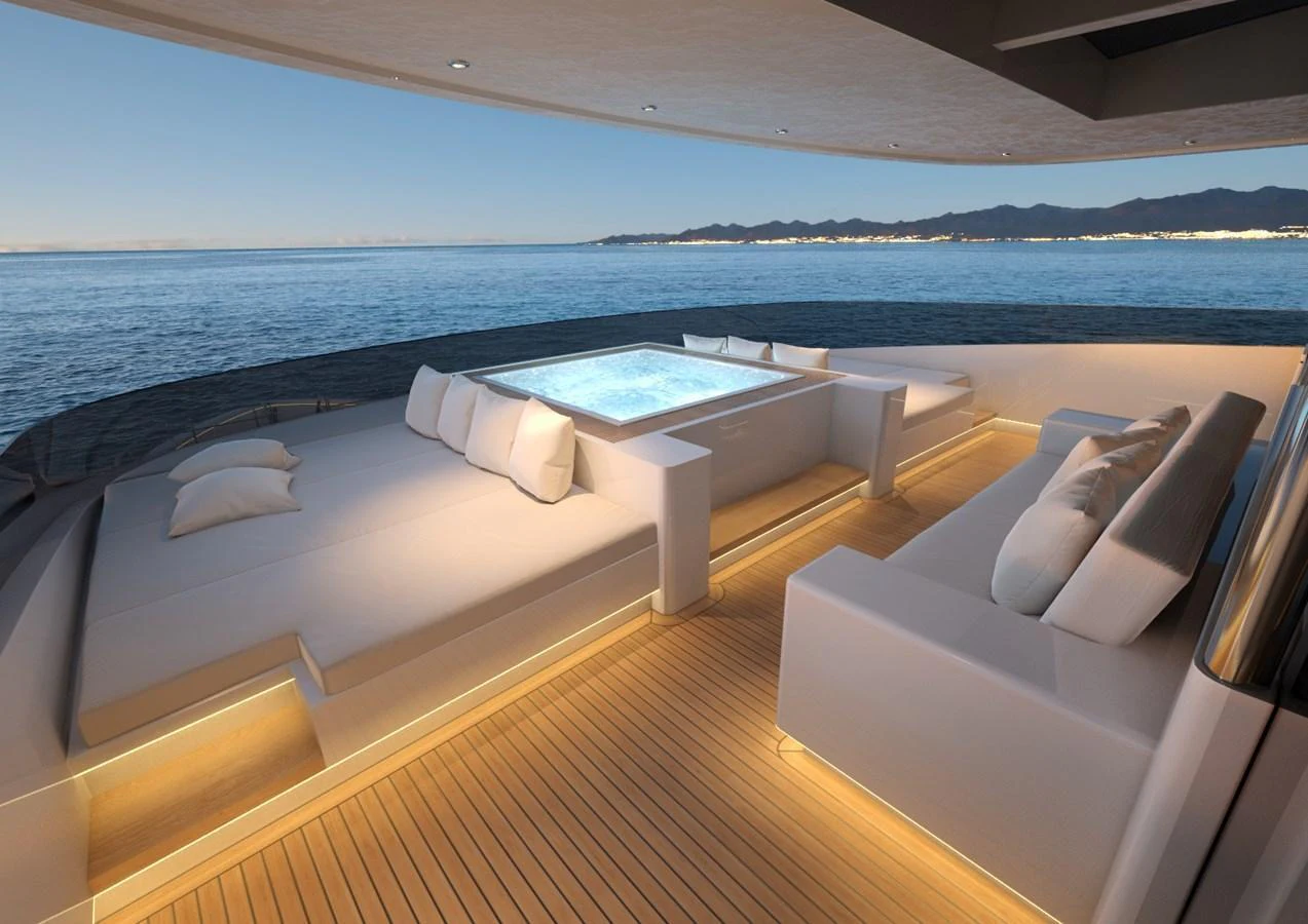 The aft deck features a luxurious jacuzzi surrounded by comfortable seating, perfect for relaxation with stunning ocean views. aboard MAGNOLIA II Yacht for Sale