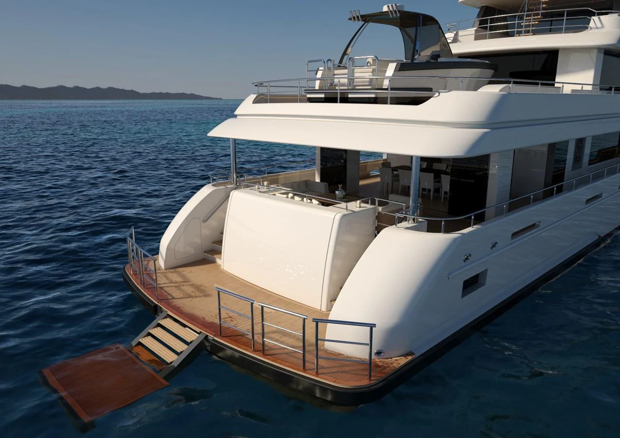 The yacht's aft deck features a spacious area with a swim platform, perfect for relaxation and water activities. aboard MAGNOLIA II Yacht for Sale